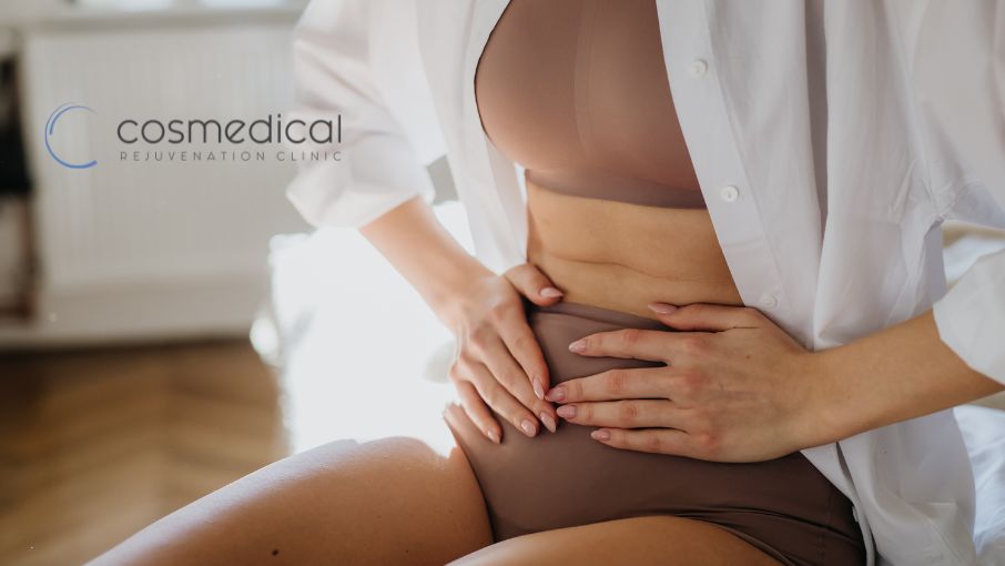 woman touching stomach