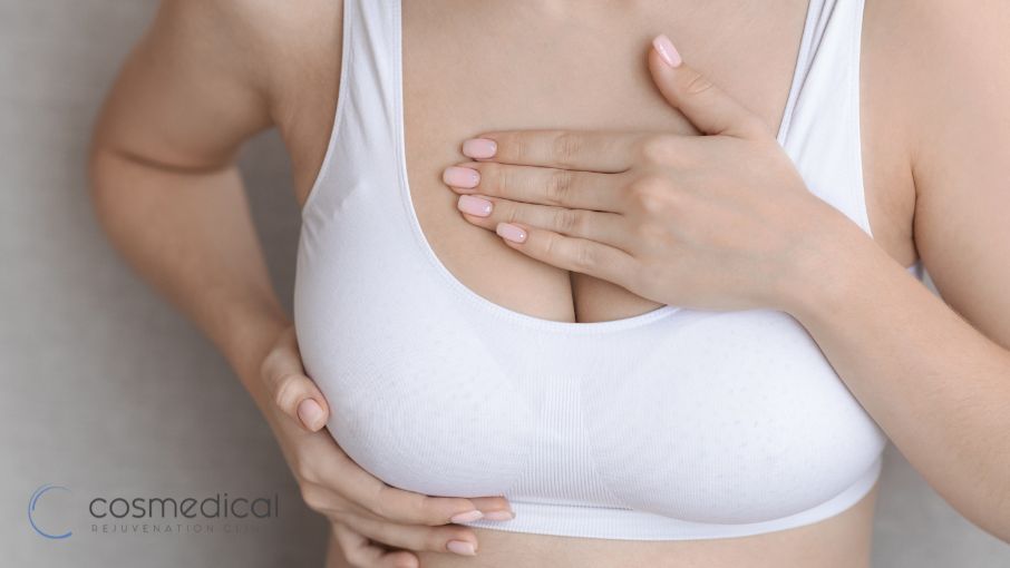 woman touching breast