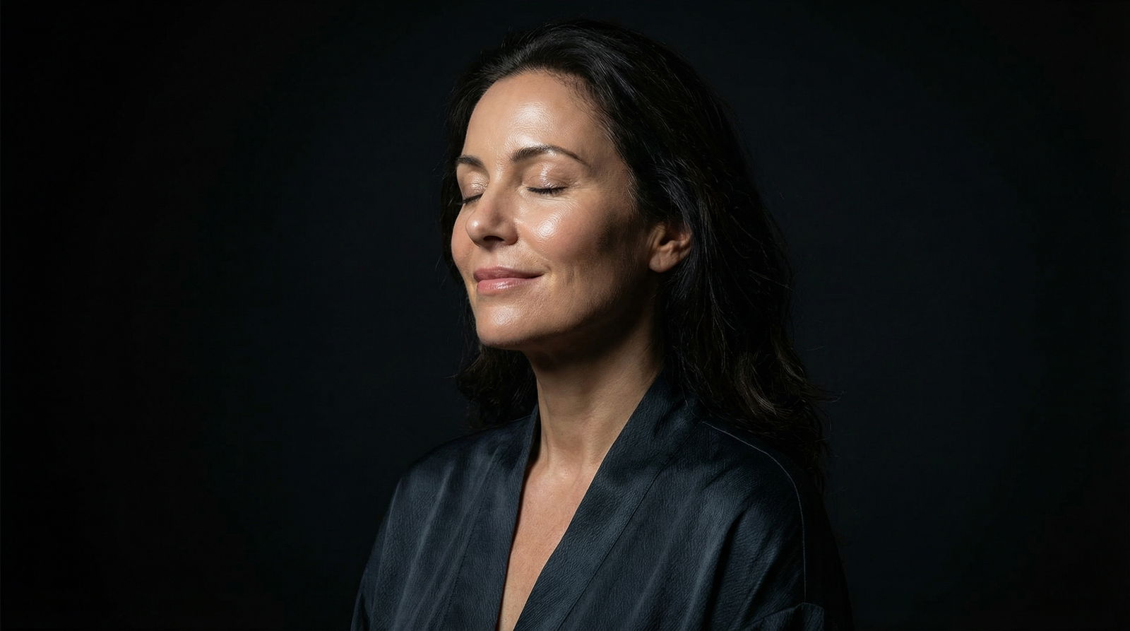 woman relaxing during eyelid surgery recovery